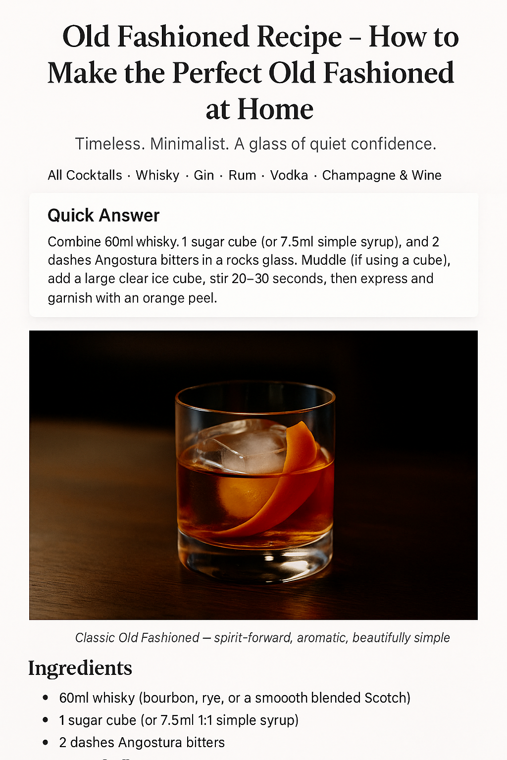 Old Fashioned cocktail with a large clear ice cube and expressed orange peel on a dark wood bar